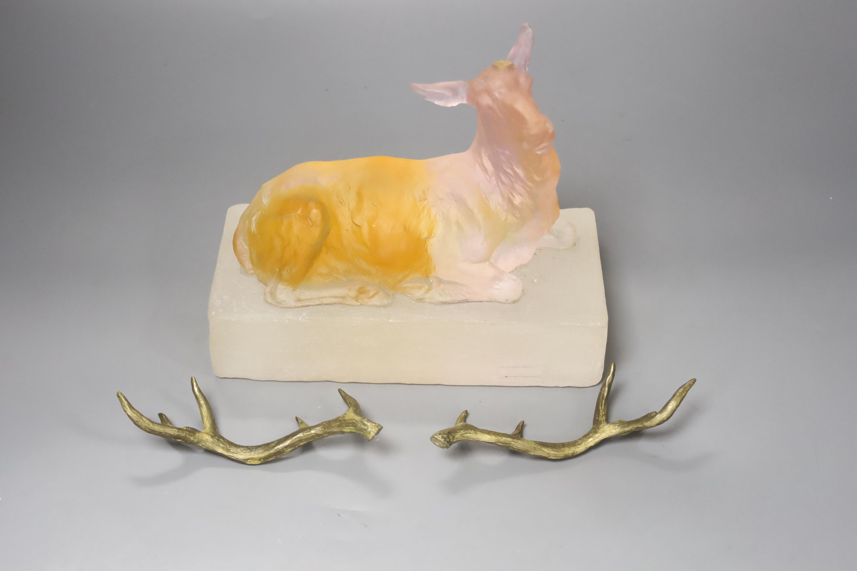 A Daum model of a recumbent stag, 21cm wide